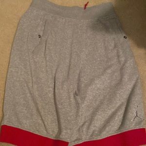 Grey Jordan shorts with red bottom